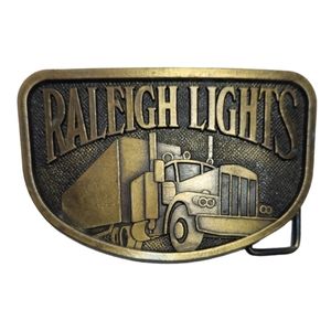 Vintage 1970 Solid Brass Raleigh Lights Belt Buckle Semi Truck Trucker